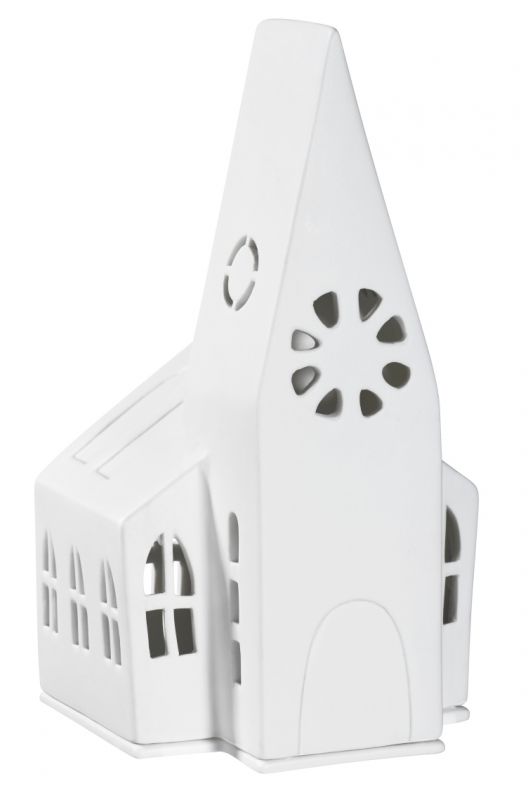 Detailaufnahme des weißen Zuhause Lichthaus Kirche Räder, einer dekorativen Keramik Kirche mit Fensteröffnungen für Teelichter.